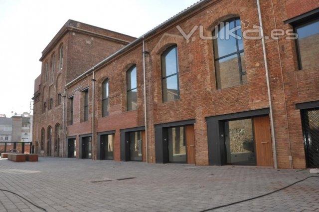 Detalle de fachada de los lofts en Barcelona en Pueblo Nuevo en el ditrito @22