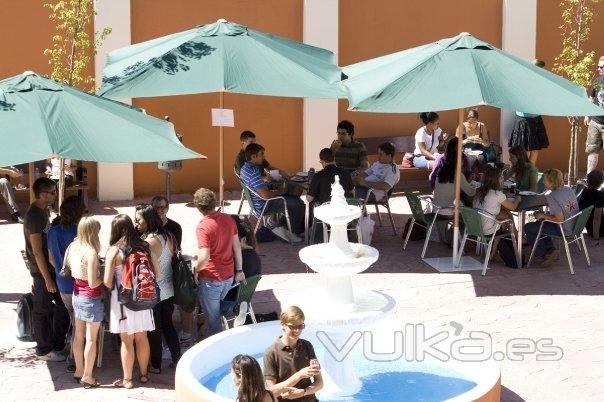 Students and faculty enjoy the new patio in Padre Rubio Hall.