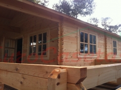 Ultimo montaje de casa de madera, modelo asti de 58mm de grosor