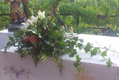 Centro mesa con lilium,manzanas y hiedra-mossy