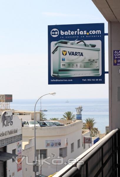 Banderola exterior tienda baterias en Marbella
