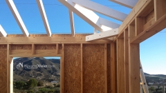 Construccion de casa de madera en entramado ligero con tejado a 4 aguas