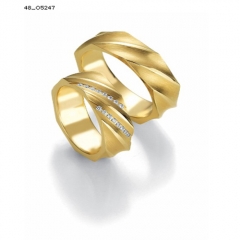 Pareja alianzas de boda en oro amarillo con diamantes serie limitada
