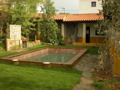 El jardin y la piscina