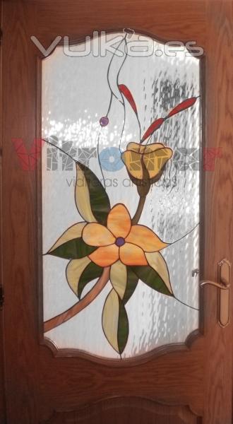 Puertas de paso en cobre de diseño floral.